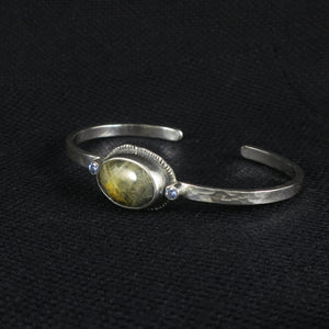 unEarthed cuff with rutilated quartz and tanzanite