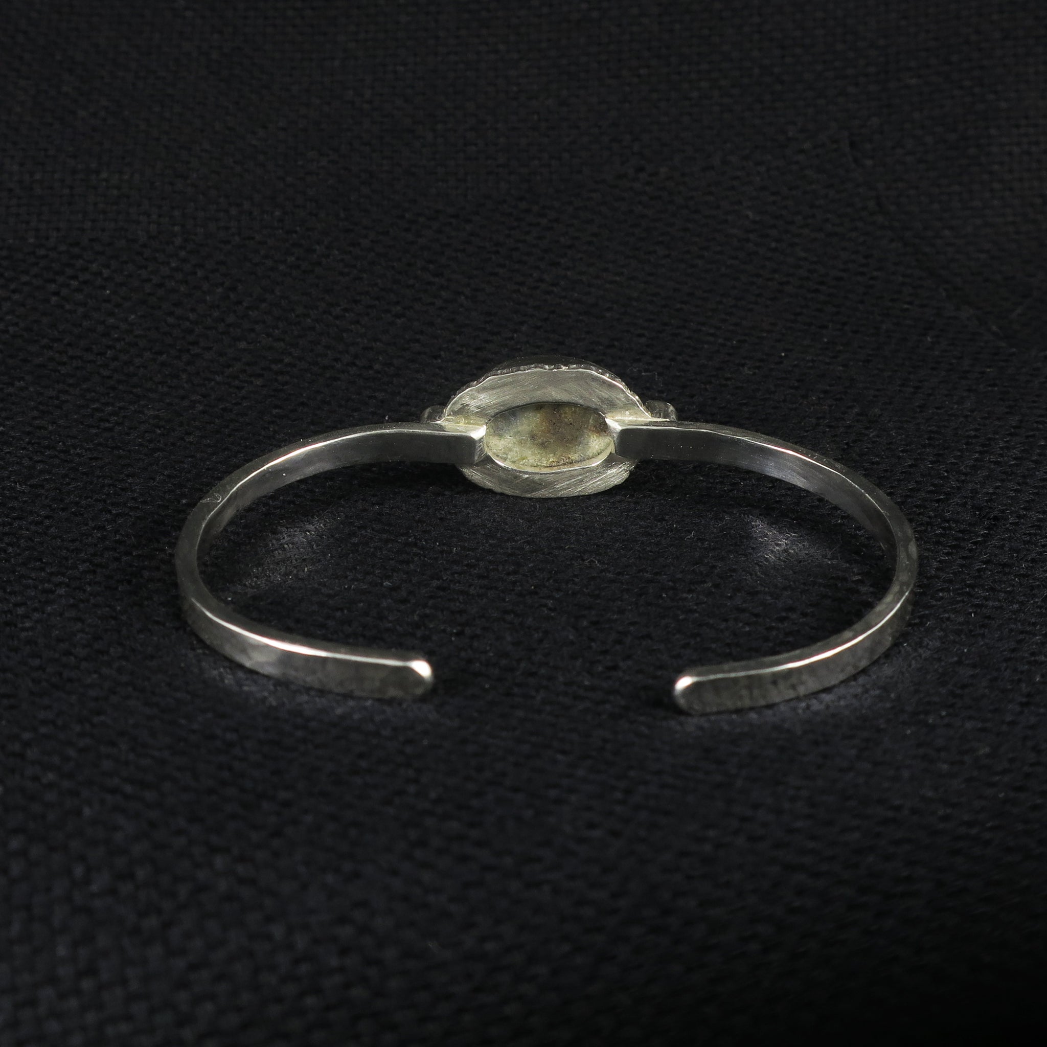unEarthed cuff with rutilated quartz and tanzanite